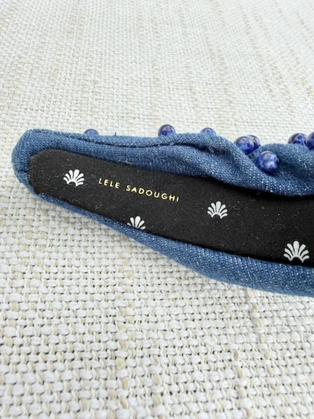 Lele Sadoughi **check out